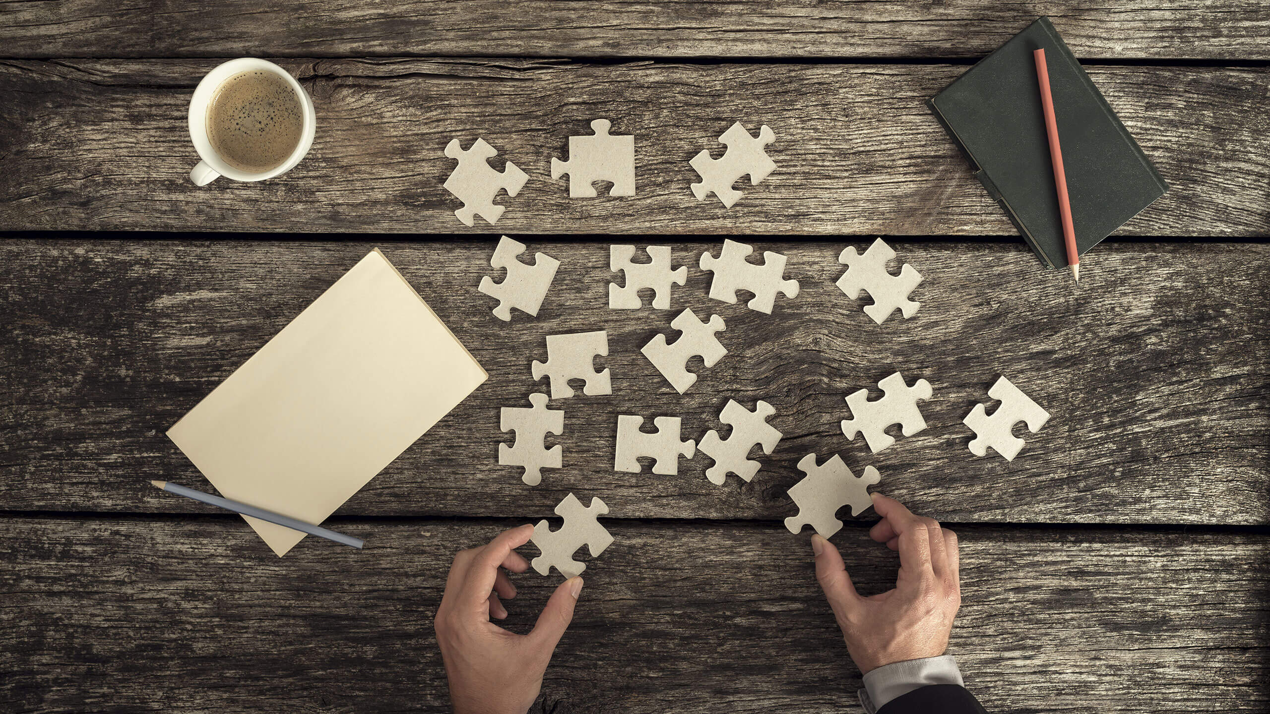 jigsaw-pieces-on-table